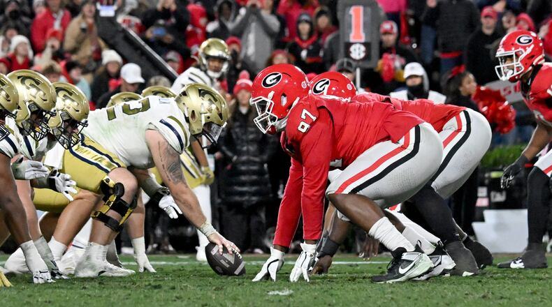 Georgia and Georgia Tech played a classic game last season at Sanford Stadium, going to eight overtimes. (Hyosub Shin/AJC)