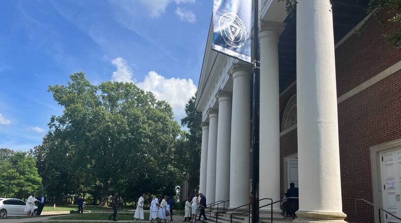 Mourners walk inside Spelman College's Sisters Chapel on Tuesday for a service celebrating the life of Christine King Farris, who taught at the college for nearly a half-century. (Avani Kalra/Avani.Kalra@ajc.com)