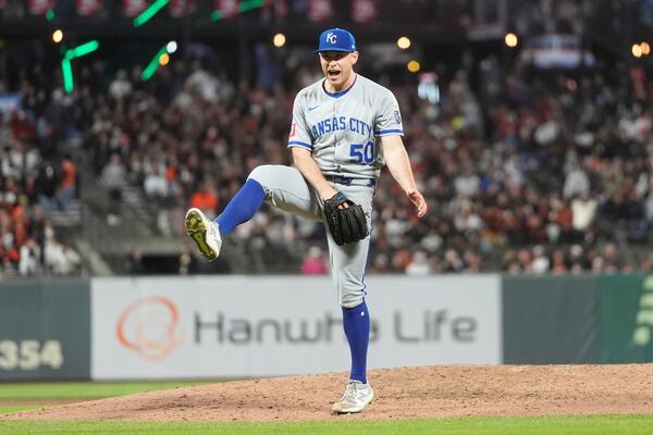 Kansas City Royals pitcher Kris Bubic (50) reacts after San Francisco Giants' Tyler Fitzgerald lined into a double play during the seventh inning of a baseball game in San Francisco, Monday, May 19, 2025. (AP Photo/Jeff Chiu)