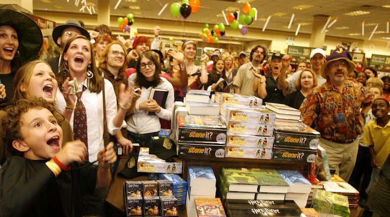 In this 2007 photo, Harry Potter fans cheered as “Harry Potter and the Deathly Hallows” was unveiled at the Barnes & Noble Buckhead in Atlanta. The celebrations are starting up again as the book series turns 20.