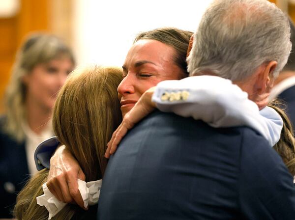Read hugs her parents Janet and William after the verdict is read in Norfolk Superior Court, Wednesday, June 18, 2025, in Dedham, Mass. (Greg Derr/The Patriot Ledger via AP, Pool)