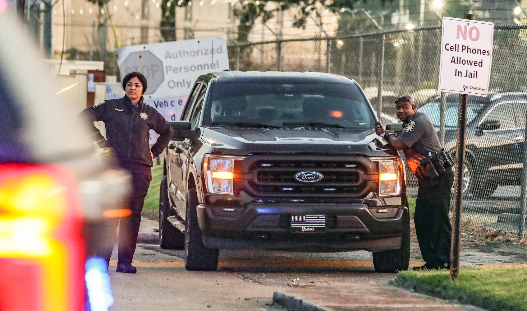 August 23, 2023 Atlanta: Sheriff deputies were at their posts at the Fulton County Jail Pretrial Services Intake entrance located at 1101 Jefferson Street NW in Atlanta on Wednesday, Aug 23, 2023 as defendants indicted alongside former President Donald Trump last week have begun to surrender at the Fulton County Jail, while others are starting to get bond after meeting with the Fulton County District Attorney’s Office. Trump plans to surrender on Thursday, he said on his social media site, after his attorneys and the Fulton County DA’s office agreed on a $200,000 bond.(John Spink / John.Spink@ajc.com)


