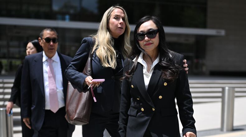 Eileen Wang, the former mayor of Arcadia, Calif., at right, exits federal court after pleading guilty on charges of acting as an illegal agent for the Chinese government on Friday, May 29, 2026, in Los Angeles. (AP Photo/William Liang)
