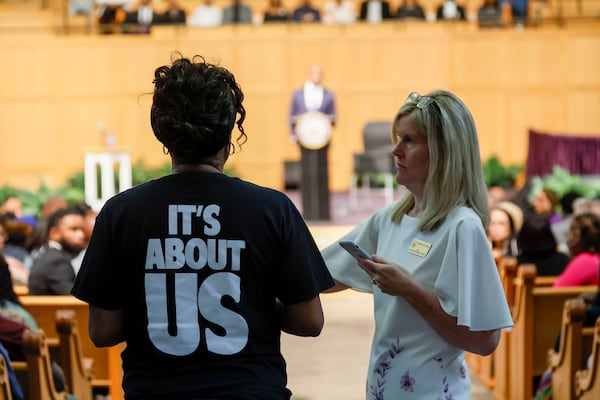 A member of the audience asks questions to U.S. Sen. Raphael Warnock, D-Ga., during a town hall meeting at Zion Hill Baptist Church on Sunday, May 4, 2025. 
(Miguel Martinez/ AJC)