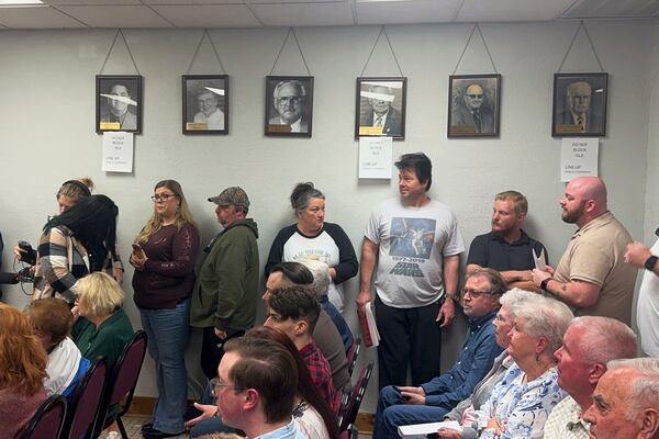 FILE - Residents line up to testify about whether the local police department should be disbanded, in Hanceville, Ala., Feb. 27, 2025. (AP Photo/Safiyah Riddle, File)