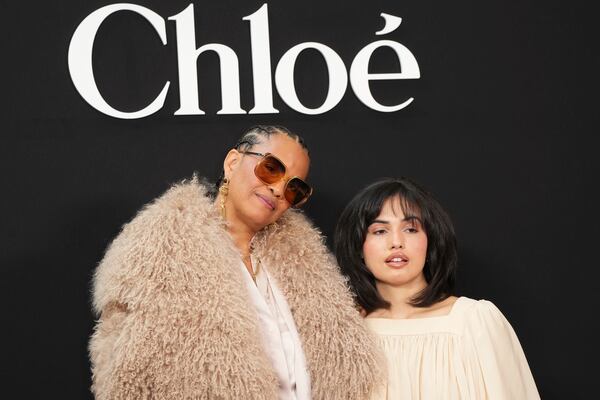 Neneh Cherry, right, and Mabel pose before the Chloe Fall/Winter 2025-2026 Womenswear collection presented Thursday, March 6, 2025. in Paris. (Photo by Scott A Garfitt/Invision/AP)