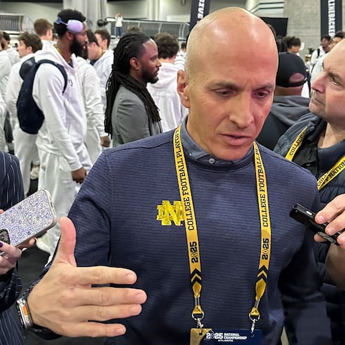 FILE - Notre Dame Athletic Director Pete Bevacqua talks during media day ahead of the College Football Playoff national championship game between Ohio State and Notre Dame Jan. 18, 2025, in Atlanta. (AP Photo/Eddie Pells, File)