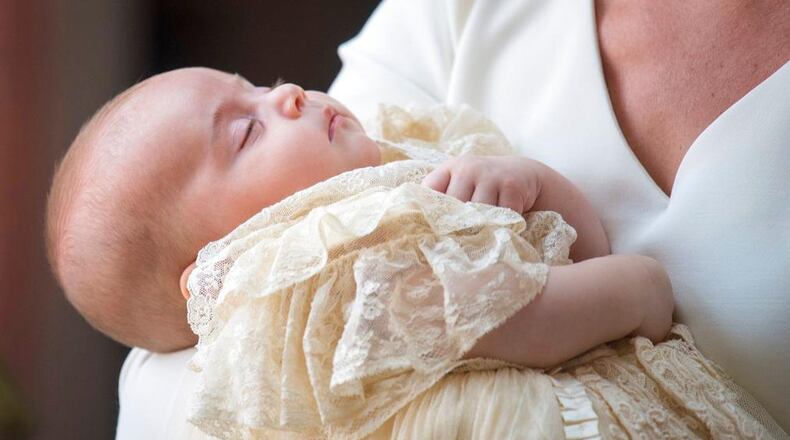 Kate, Duchess of Cambridge carries Prince Louis as they arrive for his christening service at the Chapel Royal, St James's Palace, London, Monday, July 9, 2018. (Dominic Lipinski/Pool Photo via AP)