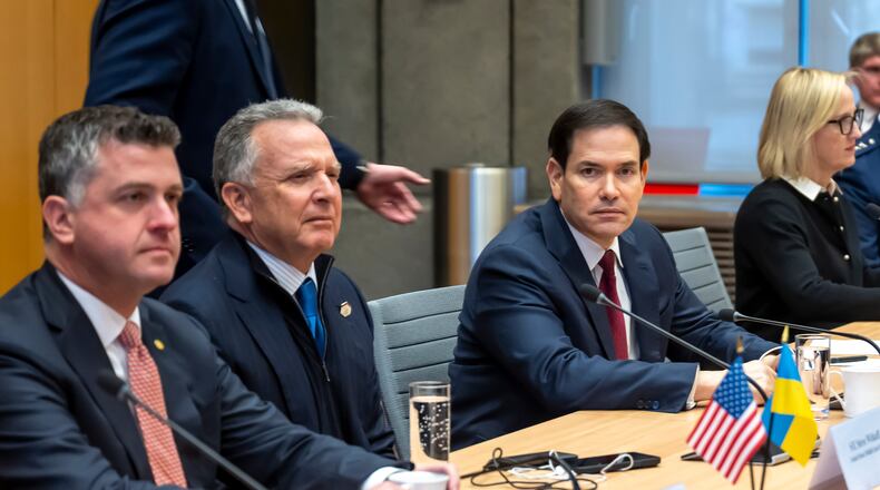 US presidential envoy Steve Witkoff, second left, and US Secretary of state Marco Rubio, right, at the beginning of talks with the Ukrainian delegation at the US Permanent Mission in Geneva, Switzerland, Sunday, Nov. 23, 2025. (Martial Trezzini/Keystone via AP)