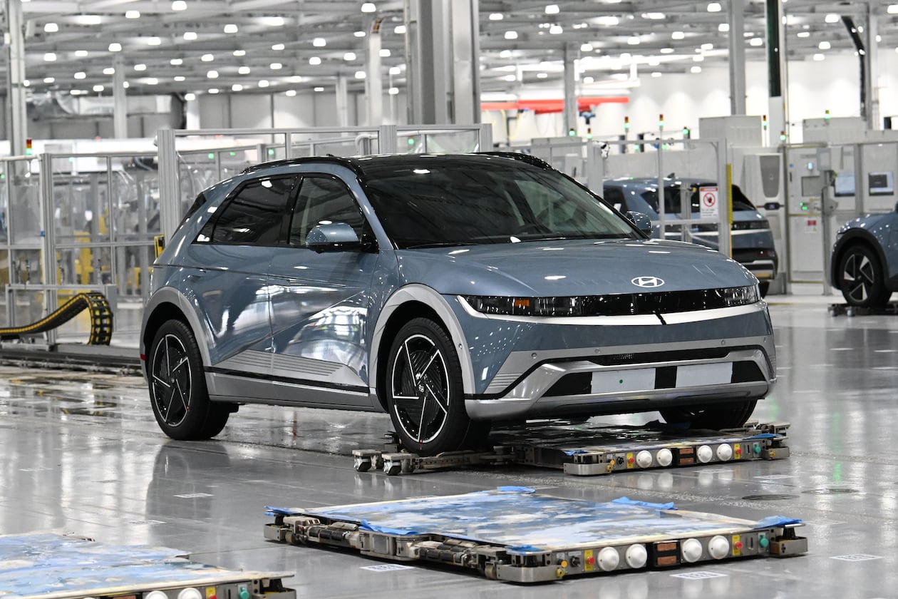 Electric vehicles are transported by autonomous mobile robots through the assembly line at the Hyundai Motor Group Metaplant America on Wednesday, May 6, 2026, in Ellabell. The Korean auto giant is evaluating plans to increase the annual production capacity at its plant near Savannah. (Hyosub Shin/AJC)