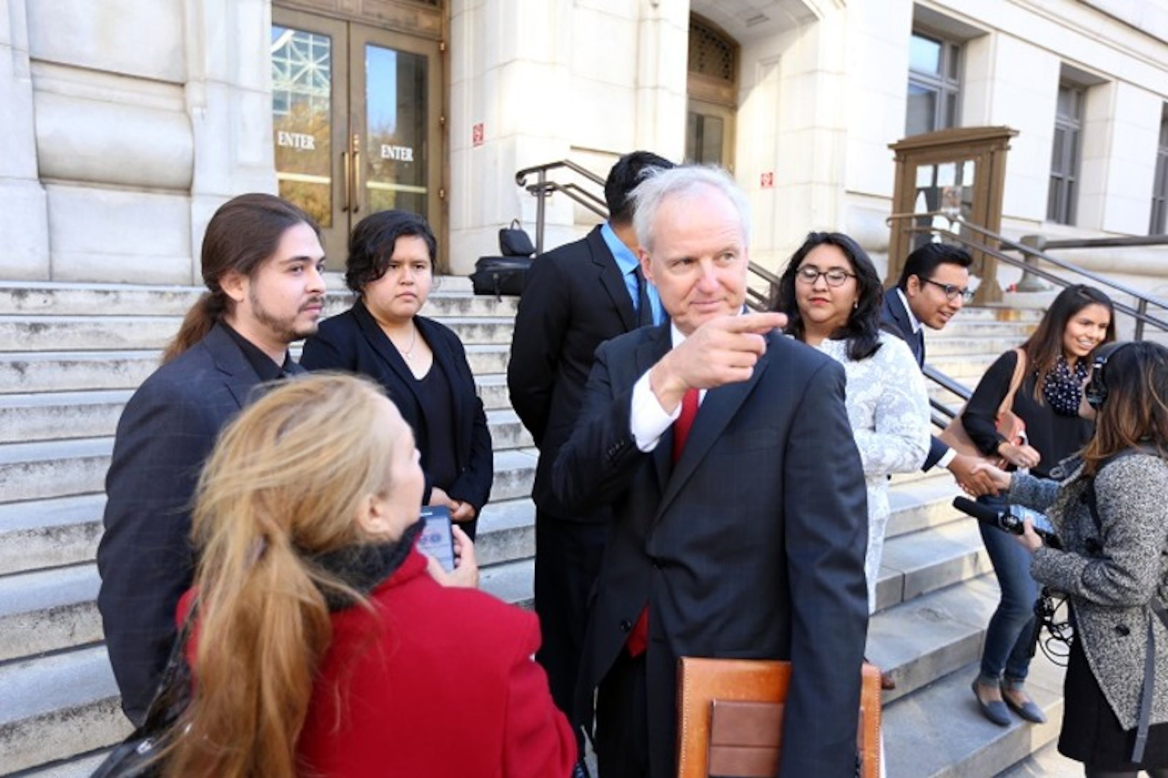 Immigration attorney Charles Kuck (shown here with plaintiffs outside the Fulton County Superior Court) says Home Depot could only turn ICE away if it created and enforced a rule that made its parking lots accessible only to customers.. (Miguel Martinez/AJC 2016)