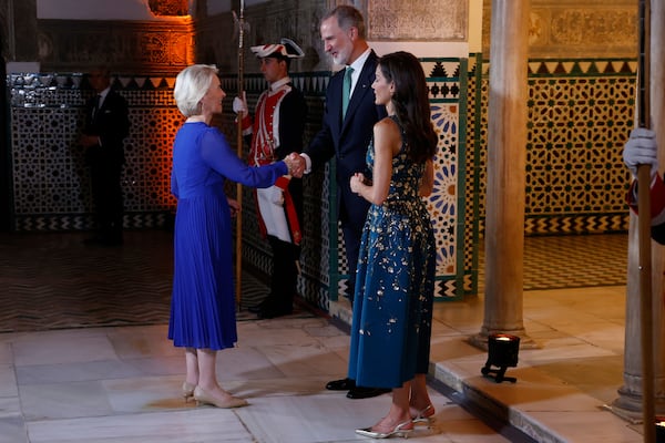 Spain's King Felipe VI and Queen Letizia greet European Commission President Ursula von der Leyen before a gala dinner on the eve of the U.N. financing for development conference in Seville, Spain, Sunday, June 29, 2025. (Mariscal/Pool Photo via AP)