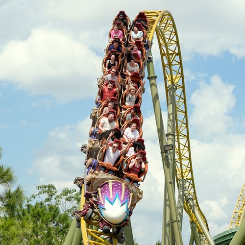 FILE - Guests ride on the Stardust Racers roller coaster at Epic Universe Theme Park at Universal Resort Orlando, April 10, 2025, in Orlando, Fla. (AP Photo/John Raoux, file)