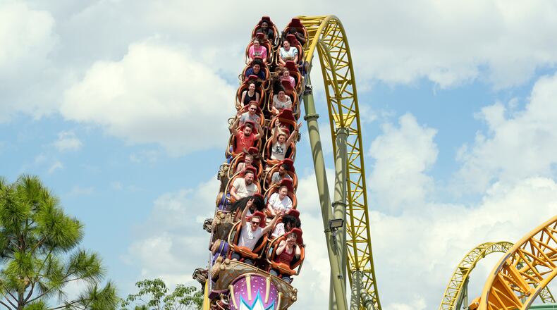 FILE - Guests ride on the Stardust Racers roller coaster at Epic Universe Theme Park at Universal Resort Orlando, April 10, 2025, in Orlando, Fla. (AP Photo/John Raoux, file)