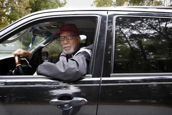 Pete Berry, 70, poses for a portrait in his car near the front of the Loch Lomond Estates neighborhood in South Fulton. Berry, who says he has lived in Loch Lomond Estates since 1985 and served as its president in the early 1990s, says that he is in support of the neighborhood being part of Atlanta largely because of tax concerns. (Casey Sykes for The Atlanta Journal-Constitution)