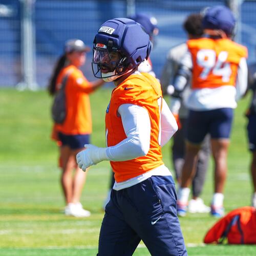 Denver Broncos linebacker Jonathon Cooper takes part in drills during a practice at the team's NFL football training camp, Wednesday, July 29, 2026, in Centennial, Colo. (AP Photo/David Zalubowski)