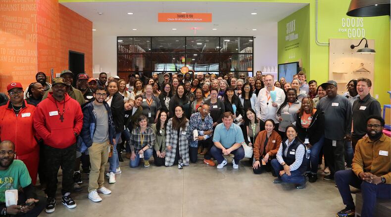 Atlanta Community Food Bank President and CEO Kyle Waide and team celebrate under the ticker when the organization served its one billionth meal since its inception in 1979. (Courtesy of Viviana Fonseca)