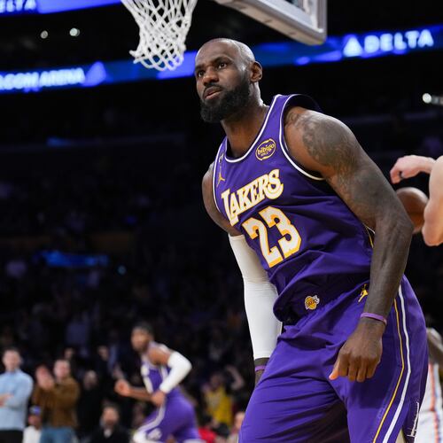 Los Angeles Lakers forward LeBron James (23) reacts after making a dunk during the first half of an NBA basketball game against the Oklahoma City Thunder Monday, Feb. 9, 2026, in Los Angeles. (AP Photo/Jae C. Hong)