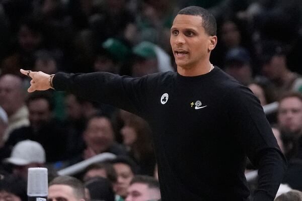 Boston Celtics head coach Joe Mazzulla calls to his players during the first half of an NBA basketball game against the Phoenix Suns, Friday, April 4, 2025, in Boston. (AP Photo/Charles Krupa)