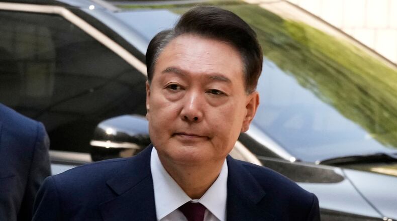 FILE - Then South Korea's ousted former President Yoon Suk Yeol who is facing charges of orchestrating a rebellion when he declared martial law on Dec. 3, arrives to attend his trial at the Seoul Central District Court in Seoul, South Korea, Monday, May 12, 2025. (AP Photo/Ahn Young-joon, Pool, File)