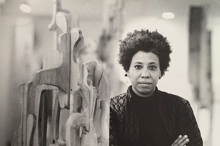 Mildred Thompson, pictured with with a free-standing wood assemblage, was a pioneer for Black female artists as an abstract painter and sculptor. (Courtesy of Galerie Lelong and the Mildred Thompson Estate)