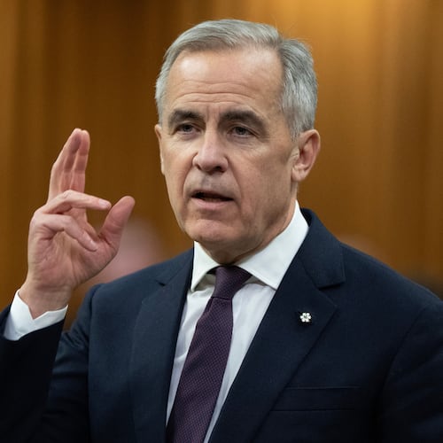 Canadian Prime Minister Mark Carney rises during Question Period, on Parliament Hill in Ottawa, Monday, Nov. 17, 2025. (Adrian Wyld/The Canadian Press via AP)