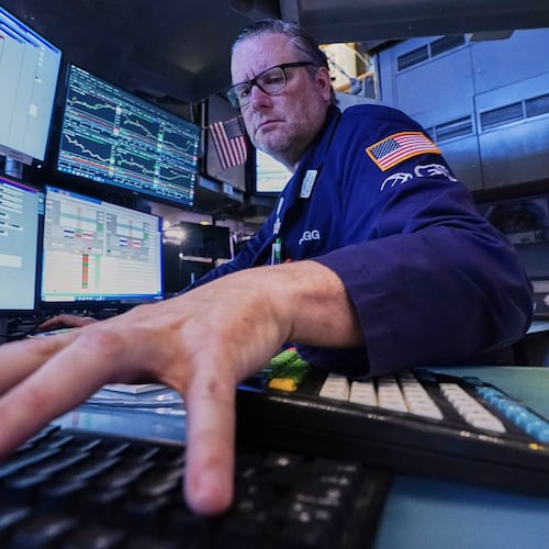 Specialist Gregg Maloney works at his post on the floor of the New York Stock Exchange, Monday, June 1, 2026. (AP Photo/Richard Drew)