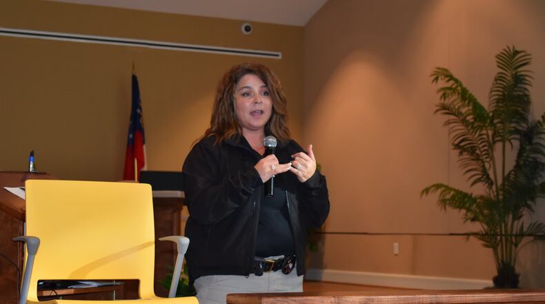 Joanne Southerland, an advocate for victims of human trafficking from the Clayton County Fire and Emergency Services, discusses the impact of forced labor and sex trafficking at a meeting Thursday in Henry County. PHOTO: LEON STAFFORD