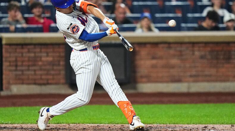 New York Mets' Tyrone Taylor hits a three-run home run during the seventh inning of a baseball game against the Atlanta Braves Monday, July 27, 2026, in New York. (AP Photo/Frank Franklin II)