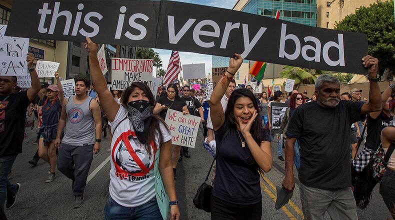 LOS ANGELES, CA - NOVEMBER 12: Protesters march in reaction to the upset election of Republican Donald Trump over Democrat Hillary Clinton in the race for President of the United States on November 12, 2016 in Los Angeles, California, United States. Hundreds of Angelenos have been arrested in recent days and some have vandalized property but the vast majority of the thousands of protesters have remain peaceful. (Photo by David McNew/Getty Images)
