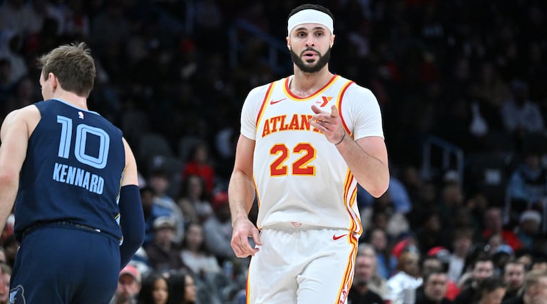 Atlanta Hawks forward Larry Nance Jr. (22) reacts after scoring during the second half in an NBA basketball game at State Farm Arena, Saturday, December 21, 2024, in Atlanta. Memphis Grizzlies won 128-112 over Atlanta Hawks. (Hyosub Shin / AJC)