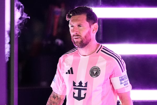 Inter Miami's Lionel Messi enters the field before the Club World Cup round of 16 soccer match between PSG and Inter Miami in Atlanta, Sunday, June 29, 2025. (AP Photo/Brynn Anderson)
