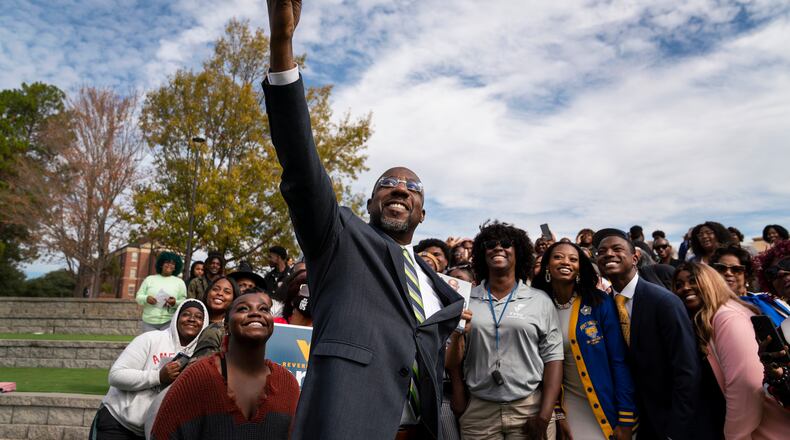 FILE — Sen. Raphael Warnock (D-Ga.) greets students at Fort Valley State University in Fort Valley, Ga., Nov. 1, 2022. Warnock, a son of Savannah public housing who rose to become Georgia’s first Black senator, secured a full six-year term and a spot among Democrats’ rising stars. (Nicole Craine/The New York Times)