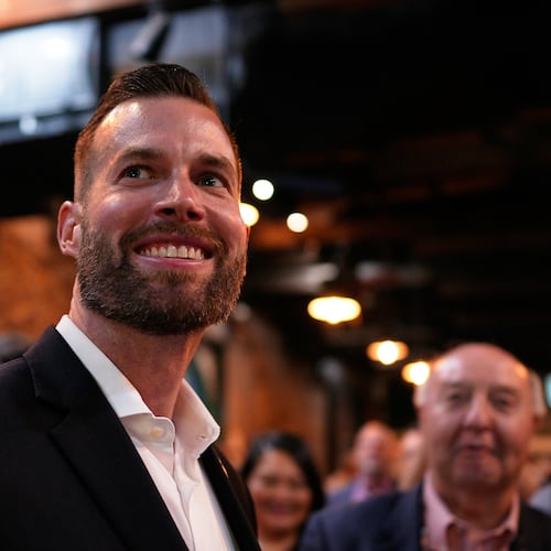 Republican candidate Clay Fuller smiles as election results roll in during an election night watch party, Tuesday, April 7, 2026, in Ringgold, Ga. (AP Photo/Mike Stewart)