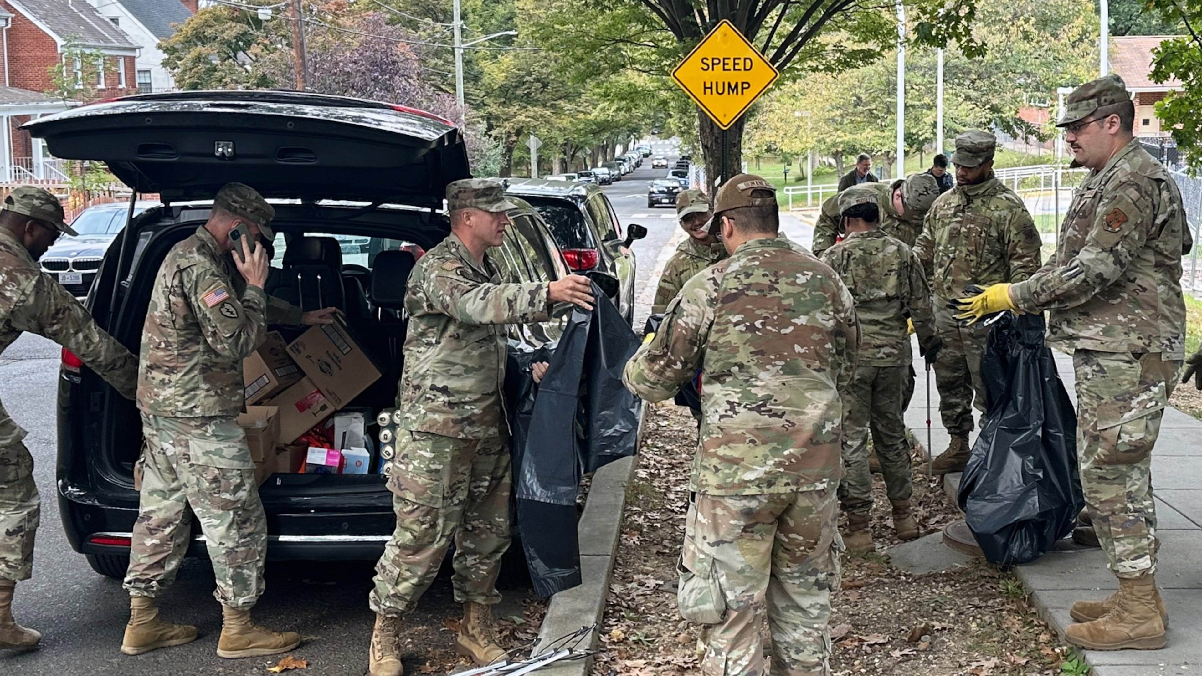 D.C. National Guard members clean up the park around Fort Stevens Recreation Center, Saturday, Oct. 11, 2025, in Washington. News of the cleanup sparked a community debate over the presence of the Guard. (AP Photo/Gary Fields)
