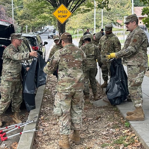 D.C. National Guard members clean up the park around Fort Stevens Recreation Center, Saturday, Oct. 11, 2025, in Washington. News of the cleanup sparked a community debate over the presence of the Guard. (AP Photo/Gary Fields)