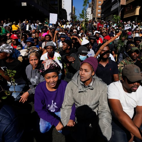 Protesters march against illegal immigration, in Johannesburg, South Africa, Tuesday, June 30, 2026. (AP Photo/Themba Hadebe)
