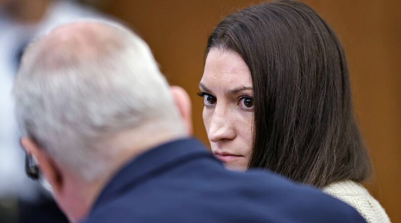 Defendant Lindsay Clancy talks with her lawyer Kevin Reddington. during her murder trial at Plymouth Superior Court, Monday, Aug. 24, 2026 in Plymouth, Mass. (Greg Derr/The Patriot Ledger via AP, Pool)