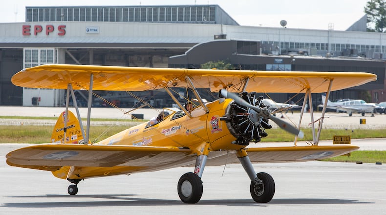 Ninety-eight-year-old World War II veteran Ken Will & Pilot John P. Cyrier taxi after a ride in a 1943 Boeing Stearman bi-plane at PDK Airport. PHIL SKINNER FOR THE ATLANTA JOURNAL-CONSTITUTION.