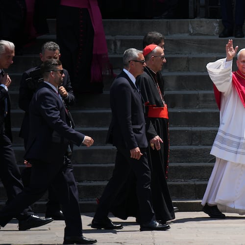 Pope Leo XIV waves to the cheering crowd after attending a midday prayer at the Cathedral of the Holy Cross and Saint Eulalia in Barcelona, Spain, Tuesday, June 9, 2026. (AP Photo/Emilio Morenatti)