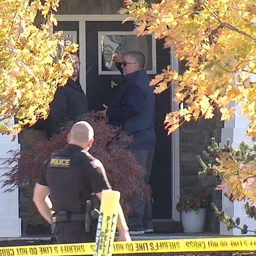 CORRECTS LAST NAME - In this image from video provided by WRTV, investigators work at the site of the fatal shooting of house cleaner Maria Florinda Rios Perez who went to the wrong address in Whitestown, Ind., on Wednesday, Nov. 5, 2025. (WRTV via AP)