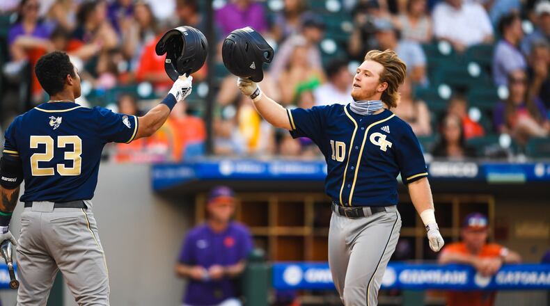 Georgia Tech first baseman Andrew Jenkins (No. 10) celebrates his third-inning home run against Clemson with teammate Stephen Reid in the Yellow Jackets' 11-5 loss at the ACC Tournament May 26, 2021 in Charlotte, N.C. (Maggie Boulton)