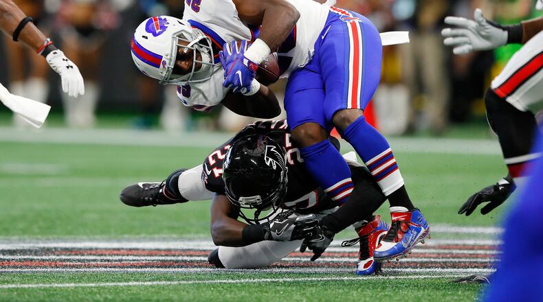 ATLANTA, GA - OCTOBER 01: LeSean McCoy #25 of the Buffalo Bills is tackled by Damontae Kazee #27 of the Atlanta Falcons during the first half at Mercedes-Benz Stadium on October 1, 2017 in Atlanta, Georgia. (Photo by Kevin C. Cox/Getty Images)