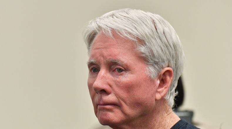 December 22, 2016 Atlanta - Claud “Tex” McIver appears before Chief Magistrate Judge Cassandra Kirk at the Fulton County jail on Thursday, December 22, 2016. Atlanta lawyer Claud “Tex” McIver, who turned himself in at the Fulton County jail Wednesday night to face charges in the death of his wife, Diane, had his first appearance in court this morning. Atlanta police have charged McIver with involuntary manslaughter, a felony, and reckless conduct, a misdemeanor, for shooting his wife in the back as the two rode in their SUV near Piedmont Park late on the night of Sept. 25. HYOSUB SHIN / HSHIN@AJC.COM