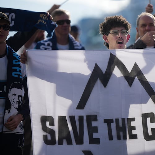 Fans of the Vancouver Whitecaps MLS soccer team rally to keep the team in Vancouver, Thursday, April 30, 2026, outside the 76th FIFA Congress in Vancouver, British Columbia. (Darryl Dyck/The Canadian Press via AP)