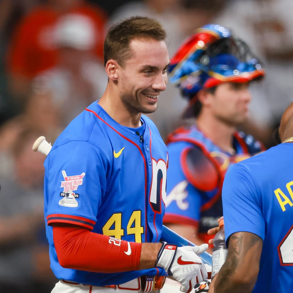 Braves first baseman Matt Olson (left) is greeted by Ronald Acuña Jr. after batting during the MLB Home Run Derby as part of the All-Star Game festivities on Monday, July 14, 2025, at Truist Park in Atlanta. (Jason Getz/AJC)