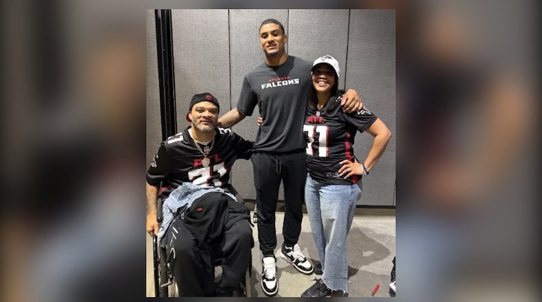 Falcons safety Xavier Watts (center) has succeeded with the help of his father, Jeff (left), and his mother, Fallon. (Courtesy of the Watts family)