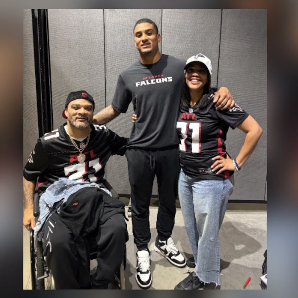 Falcons safety Xavier Watts (center) has succeeded with the help of his father, Jeff (left), and his mother, Fallon. (Courtesy of the Watts family)