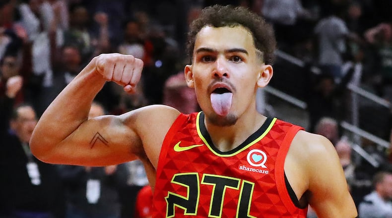 Atlanta Hawks guard Trae Young reacts to hitting the game winning shot as time expires in overtime to beat the Milwaukee Bucks 136-135 in a NBA basketball game on Sunday, March 31, 2019, in Atlanta. Curtis Compton/ccompton@ajc.com