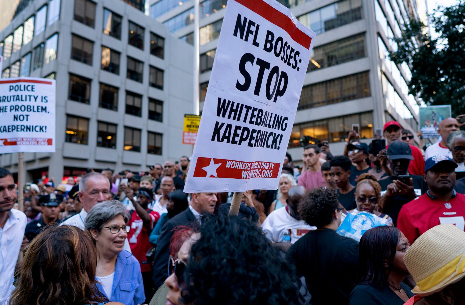 Photos: Colin Kaepernick supporters rally at NFL offices